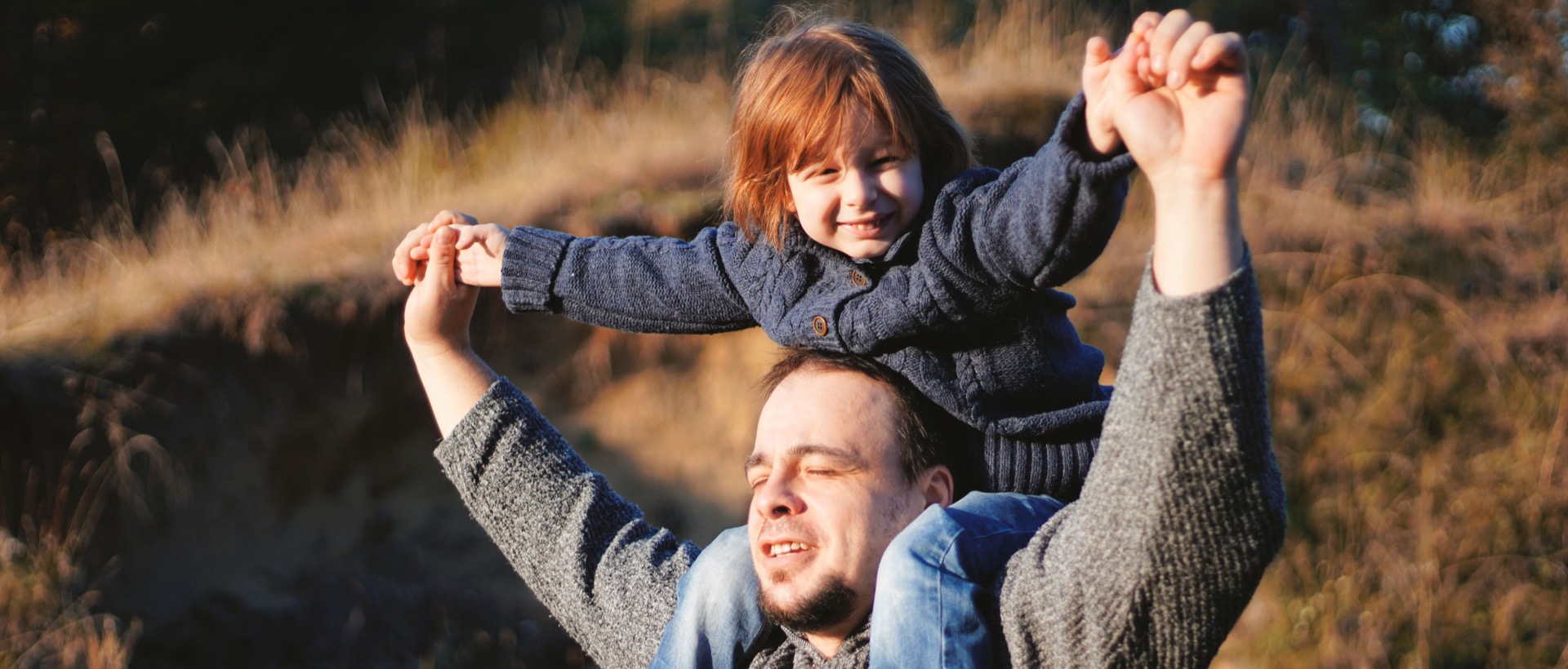 Young child having a shoulder ride